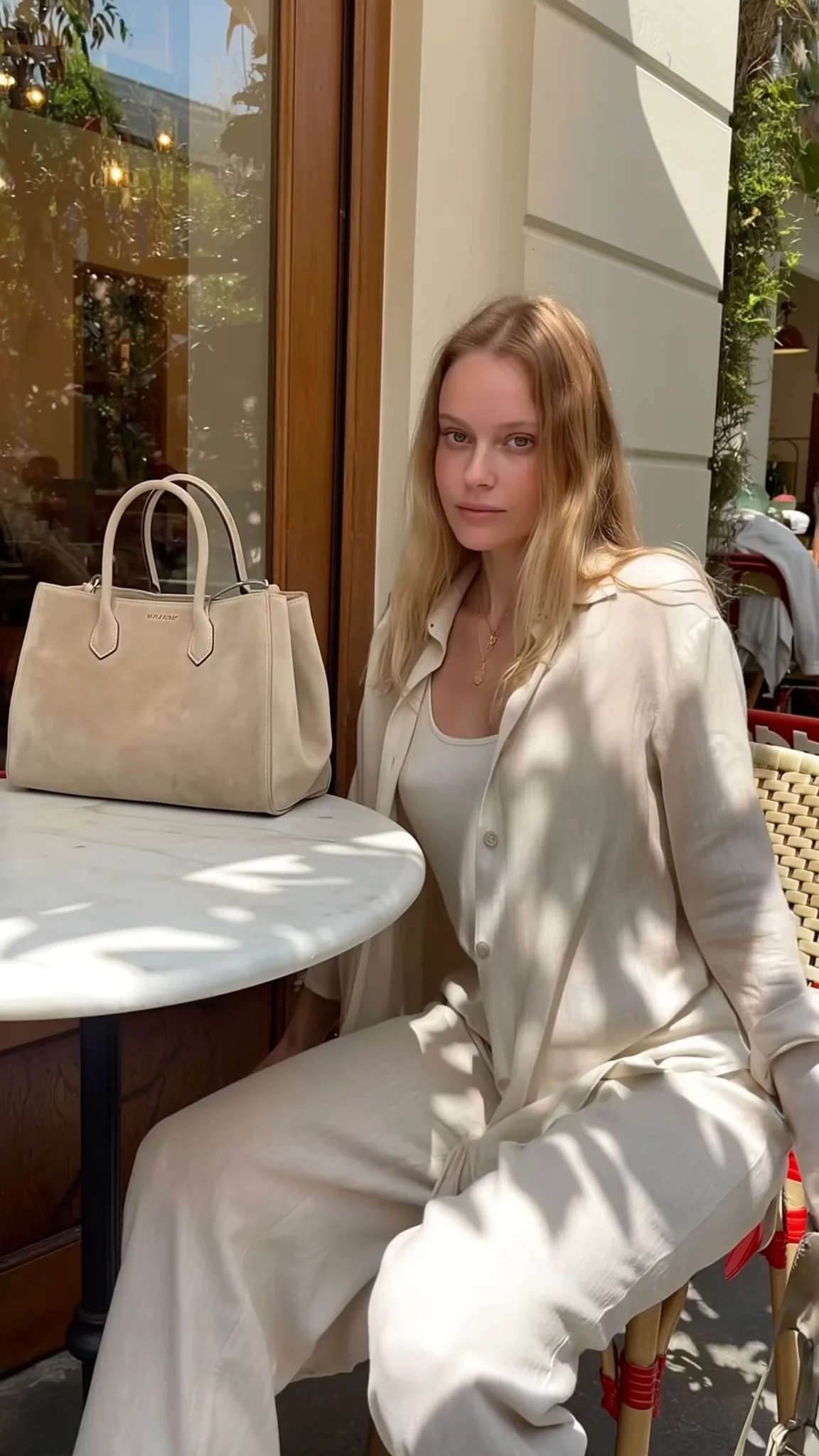 Sofia at a Paris café table